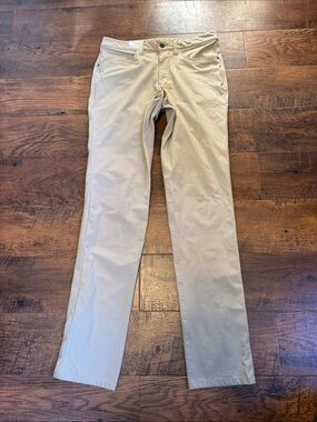 Lululemon ABC pants in 30 tall. They are traditional tan khaki color.
